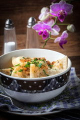 Dumplings with meat, onion and bacon.