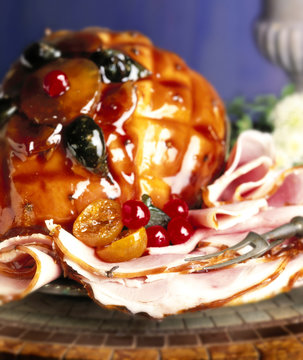 Honey Glazed Ham, ham slices with glazed fruit and fork