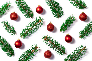 Christmas pattern with fir branches and red christmas balls