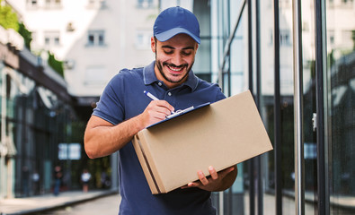 On time. Courier delivering package