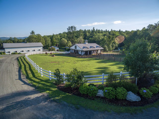 Rural horse barns with paddock