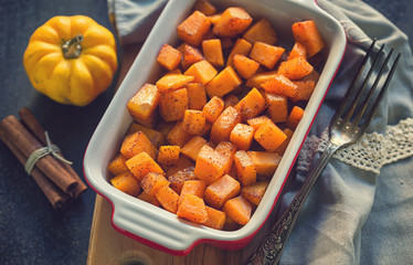 Pumpkin with honey and cinnamon baked in oven