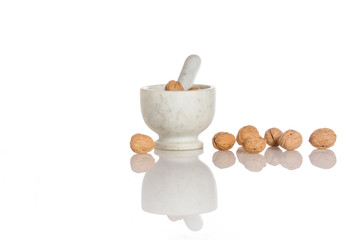 Composition with nuts and mortar - concept