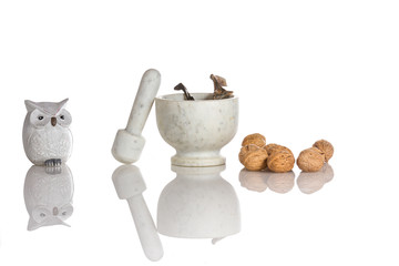 Composition with nuts and mortar - concept