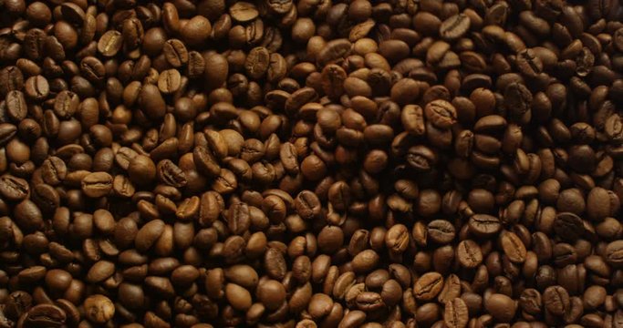 Coffee Beans Grinding Top Shot Close Up with Light Changing Red Camera
