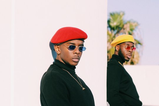 Two men wearing berets