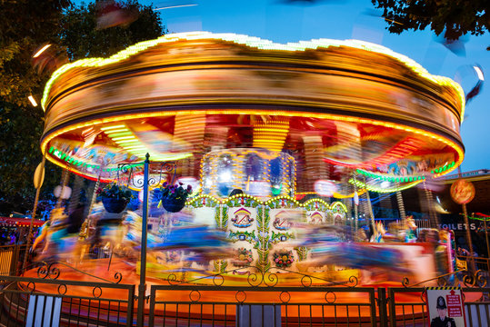 Long exposure of a blurry carousel in motion