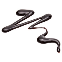 Chocolate syrup drop isolated on white background