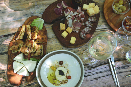 Albanian food in the famous restaurant Mrizi I Zanave in village Fishte, region of Zadrima. Domestic food appetizers and wine.