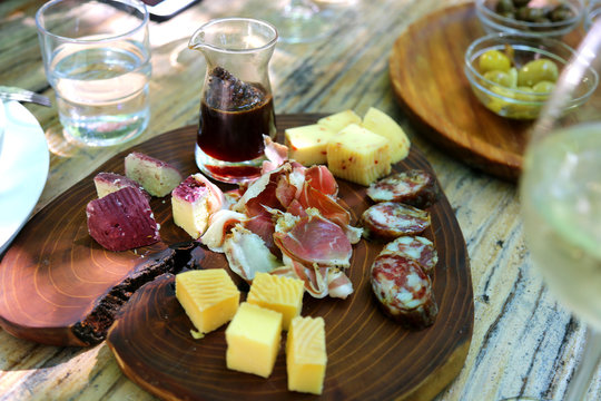 Albanian food in the famous restaurant Mrizi I Zanave in village Fishte, region of Zadrima. Domestic food appetizers and wine.