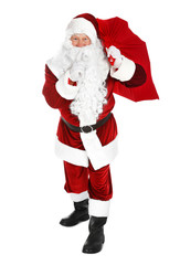 Authentic Santa Claus with bag full of gifts on white background