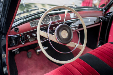 Wedding car oldtimer decorated with flower heart