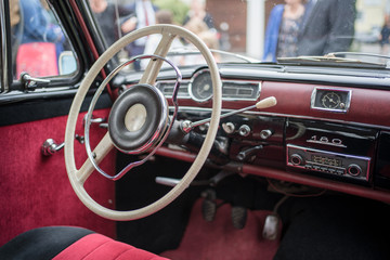 Wedding car oldtimer decorated with flower heart