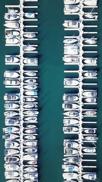 overhead view of many boats in a marina