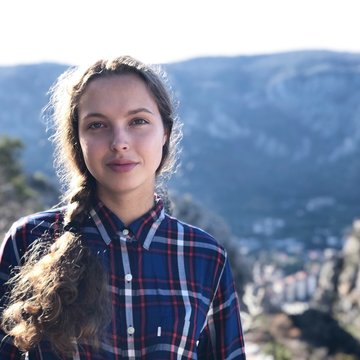 Portrait of young woman outdoors