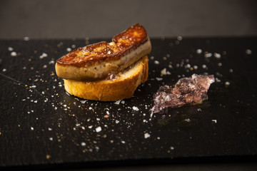 Spanish foie tapa with lilac sauce and bread © robcartorres