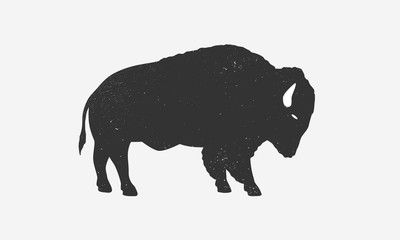 Bison icon silhouette with grunge texture. Buffalo silhouette isolated on white background. Vector illustration - obrazy, fototapety, plakaty