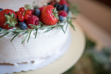 White wedding cake with berries