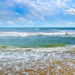 Beautiful seascape and blue sky. Sand beach.