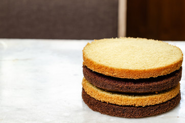 Fototapeta na wymiar Chocolate Vanilla Sponge Cake for Birthday Cake