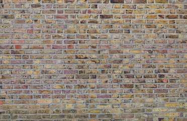 Panoramic View of Empty Old Urban Brick Wall Background With Copy Space. Creative Vintage Multicolored Texture Template. London Retro Style Building.