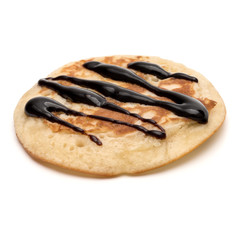 One pancake with chocolate syrup isolated on white background cutout.