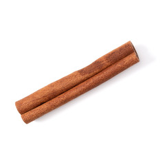 Cinnamon stick isolated on white background closeup. Canella spice. Aromatic condiment background. Flat lay, top view.