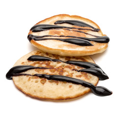 Two pancakes isolated on white background cutout.