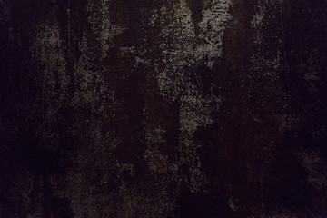 Dark black and brown background texture of a wallpaper with rusty stain and metallic pattern.