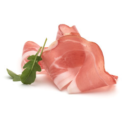 Italian prosciutto crudo or jamon. Raw ham. Isolated on white background