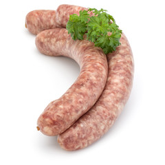 Raw sausage with parsley leaf isolated on white background