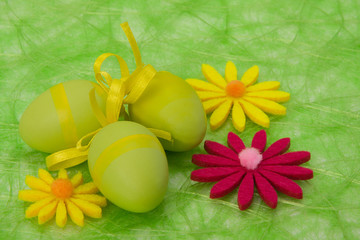 Easter background. Easter eggs and flowers.
