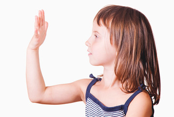 Fototapeta premium Little girl is learning to count on her fingers