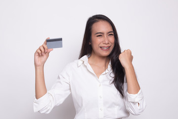 Young Asian woman fist pump with blank card.