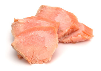 smoked salmon segments isolated on white background cutout. Prepared fish fillet fibres.