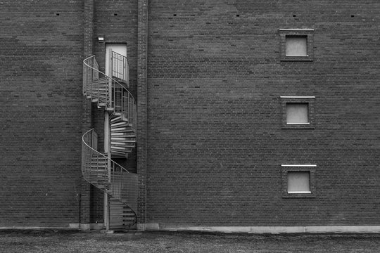 Grayscale photo of stairs