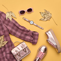 Autumn Arrives. Fall fashion Clothes Accessories Outfit, Maple Leaf. Creative minimal Flat lay....