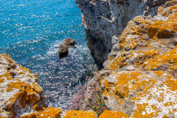 The sea waters under the colorful rock massifs in Tyulenovo - one of the most picturesque but also dangerous places on the Northern Black Sea coast, Bulgaria.