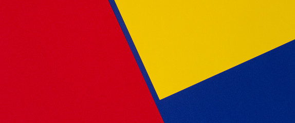 Abstract blue, red and yellow color paper geometry composition background