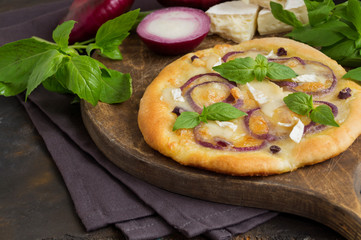 traditional Italian pizza with onion and Basil.