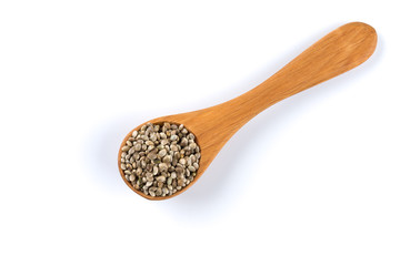 Cannabis Hemp seeds in spoon on white