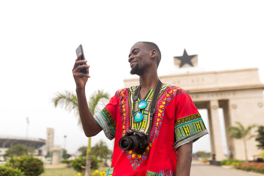 Man visiting taking a selfie in Accra