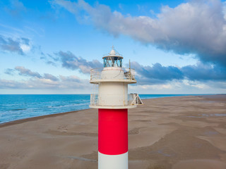 Fototapeta premium The lighthouse in Deltebre, Catalonia, Spain. Drone aerial photo