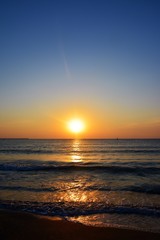 a sunrise on the beach in Eforie Nord