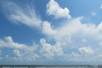 Naklejka na ściany i meble Beautiful clouds view over the ocean in Florida