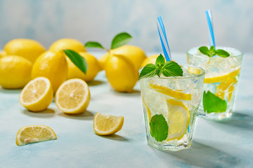 Homemade lemonade  on a light background, cold refreshing drink .