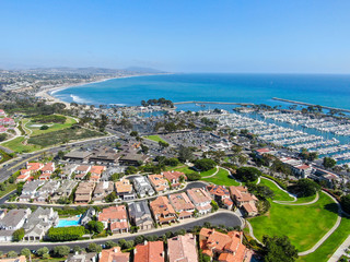 Aerial view of Dana Point Harbor town and beach - obrazy, fototapety, plakaty