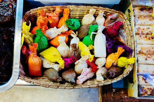 Selective focus of color wrapped sweets in basket