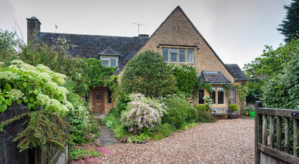 STANTON, ENGLAND - MAY, 26 2018: Stanton is a village in the Cotswolds district of Gloucestershire and is built almost completely of Cotswold stone, a honey-coloured Jurassic limestone  