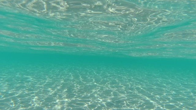Underwater video of turquoise exotic open ocean sea bed in Caribbean sandy island beach